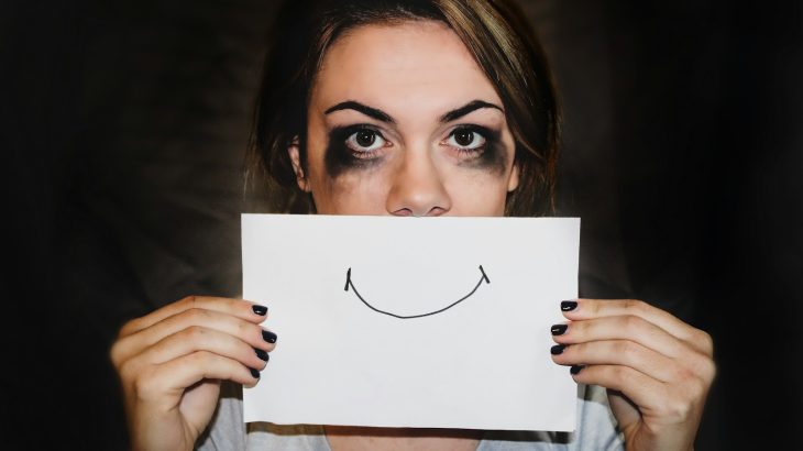 person holding white printer paper